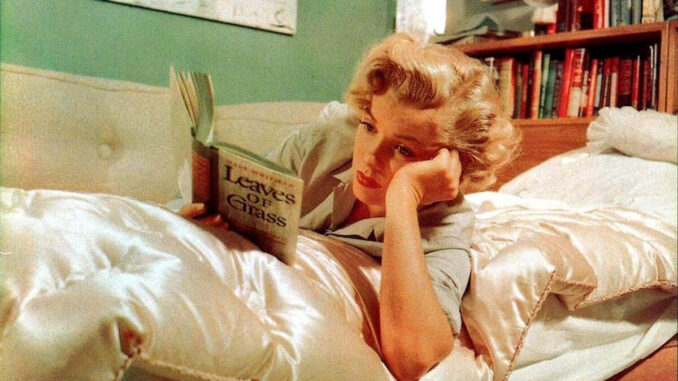 John Florea, Marilyn Monroe reading Leaves of Grass, 1952.
